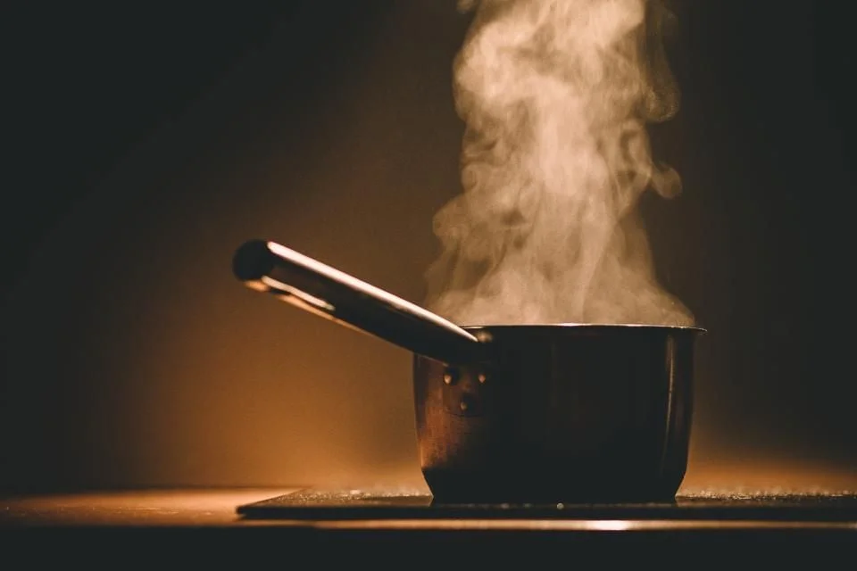Steaming pot on a stove